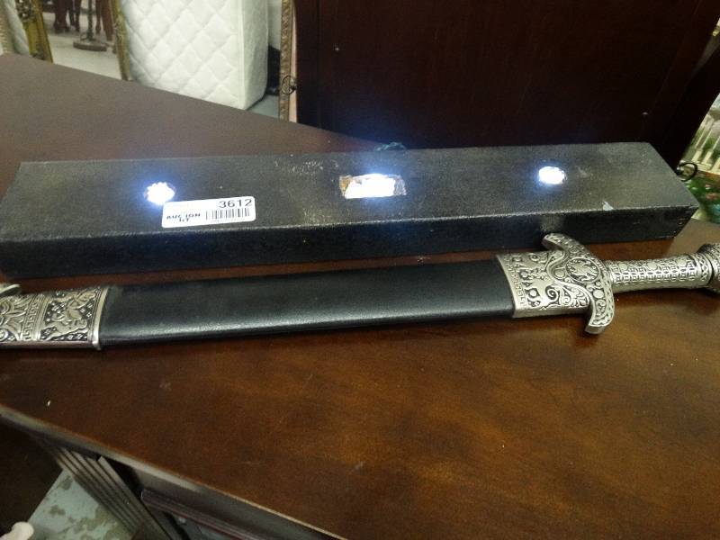 lot 3612 image: Decorative Sword wSheath on lighted Display Stand.
