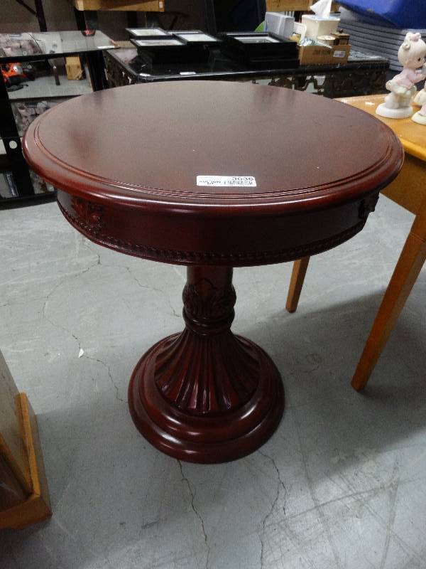 lot 3636 image: Round Carved Wood Side Table.