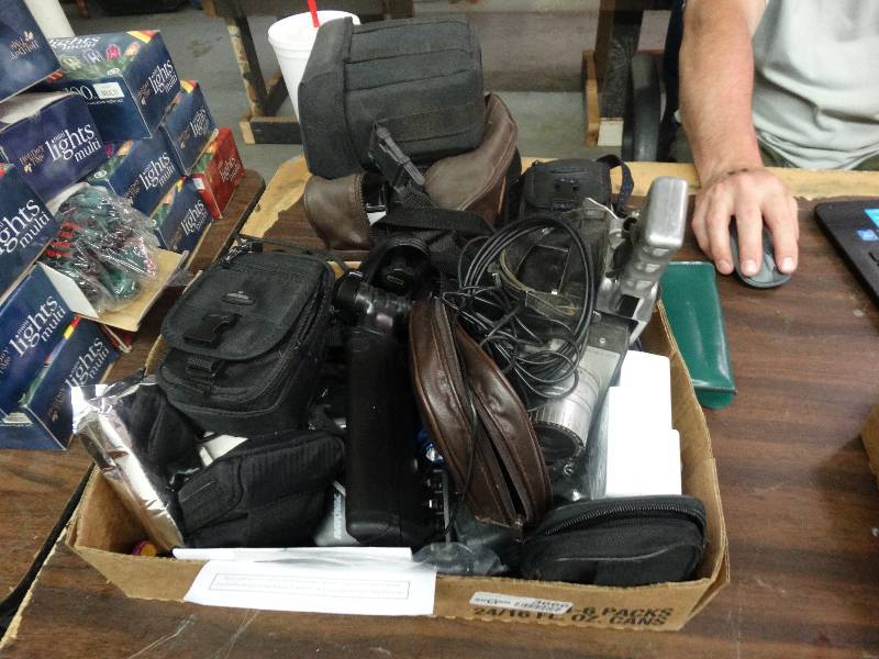 lot 3666 image: Box of Cameras, Binoculars, GPS, Camcorder, Maglite, Bell & Howell Movie Camera, Remote Siren.