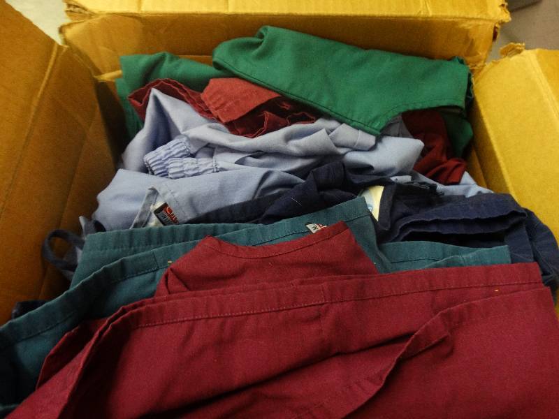 lot 3691 image: Box of Scrubs. 9 tops, & 9 Bottoms.