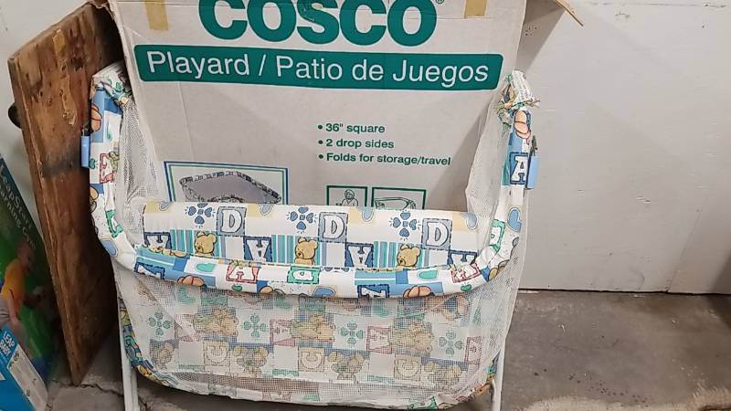 lot 22 image: Cosco Playpen - 2 Drop Sides