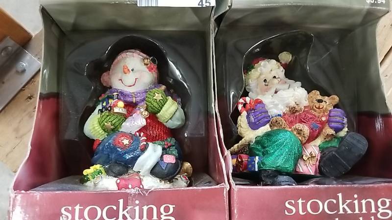 lot 45 image: 2 Large Christmas Stocking Holders  DECOR