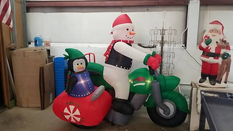 lot 34 image: Large Motorcycle Riding Snowman and Sidecar Penguin -  Inflatable Christmas Yard Decoration