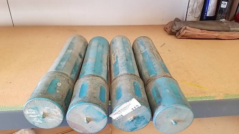 lot 112 image: 4 Rod Guard Welding Rod Storage Tubes and Contents