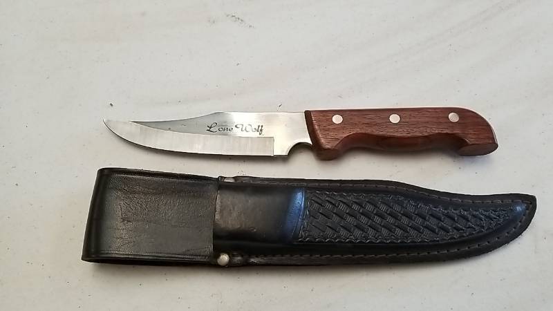 lot 157 image: Approximately 11 inch Hunting Knife- Fixed Blade With Leather Sheath