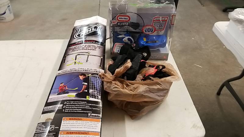lot 180 image: Toy Lot-  Hockey- Knee and Elbow Pads- And Little Tike Helicopter