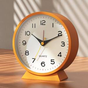 lot 16449 image: AYRELY� 4.5 Analog Alarm Clock,Small Retro Desk Clock Battery Operated,Slient Metal Table Clock with Light for Living Room Decor,Bedroom,Bedside,Shelf (Orange)