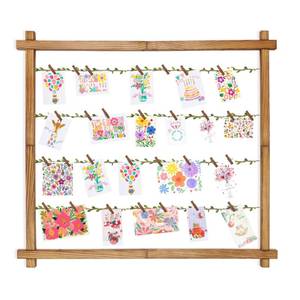 lot 80751 image: NIUBEST Photo Display Board with 30 Clips,Picture Frames Collage Wall Decor for Hanging Photos, Artworks, Postcards, Greeting Cards (Carbonized Black)