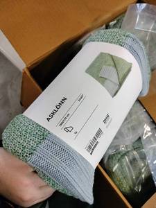 lot 8009 image: IKEA Asklonn Throw Blanket - Green