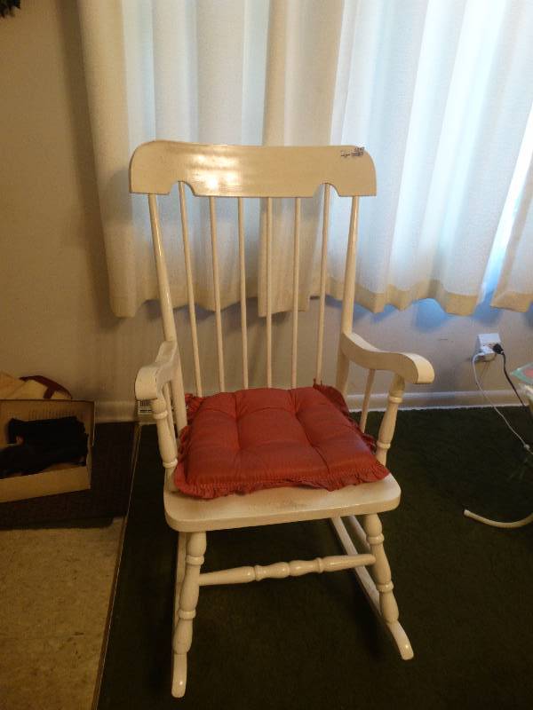 lot 5297 image: Rocking chair with cushion.