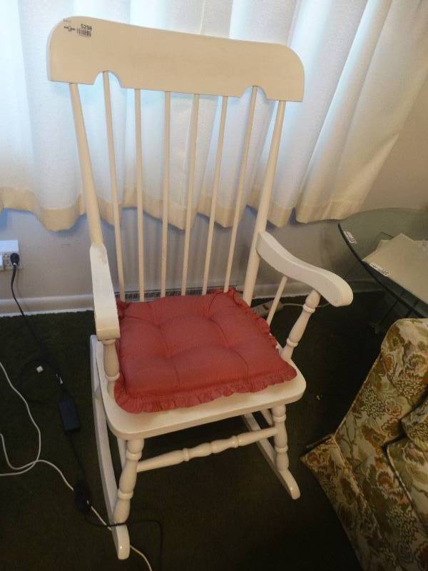 lot 5298 image: Rocking chair with cushion.