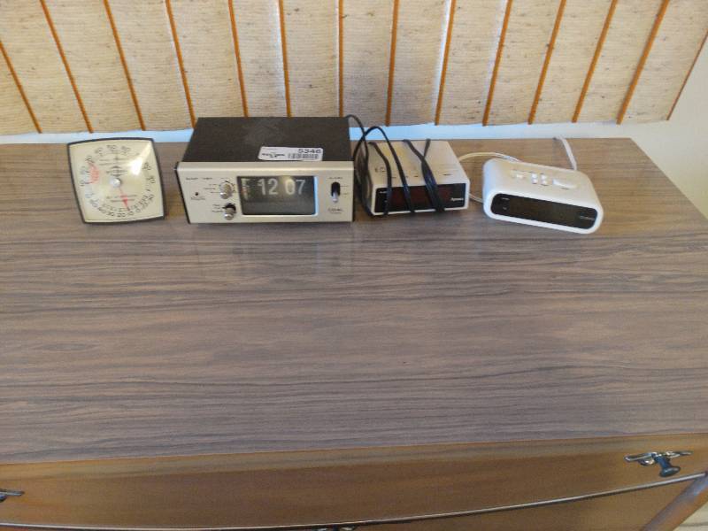 lot 5346 image: West bend humidity gauge and 3 alarm clocks.