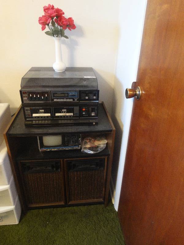 lot 5348 image: AMFM cassette sony radio with record players, speakers and emerson small tv radio combo.