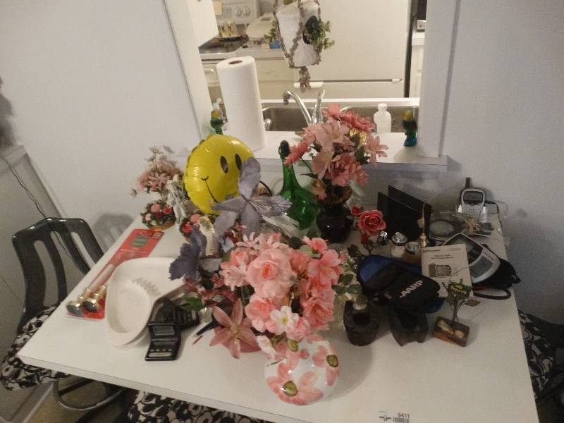 lot 5411 image: Contents on table.Table and chair not included.