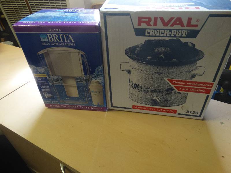 lot 5503 image: A Rival crock-pot 3 12 Quart, a ultra brita water filteration pitcher.