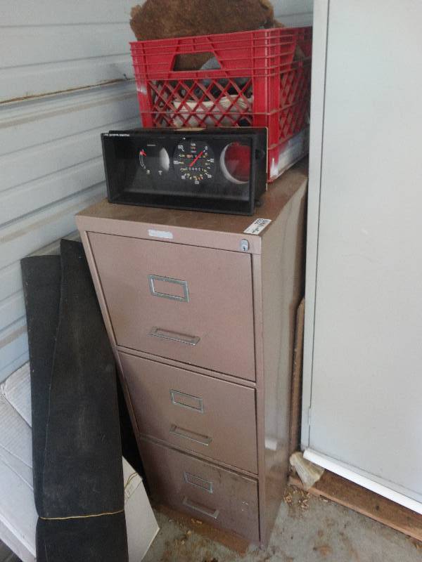 lot 5558 image: 3 Drawer file cabinet with contents.