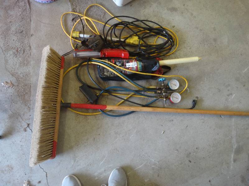 lot 5580 image: Lot of extension cords, gauges, duster and shop broom.