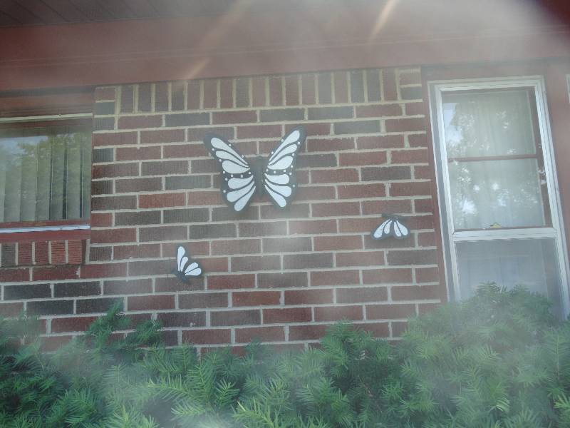 lot 5596 image: Butterfly yard decor.