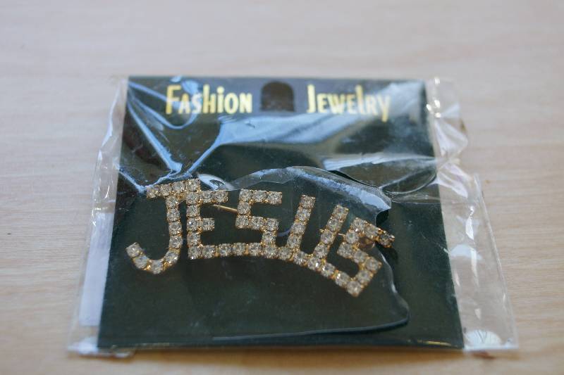 lot 398 image: Rhinestone Jesus Pin