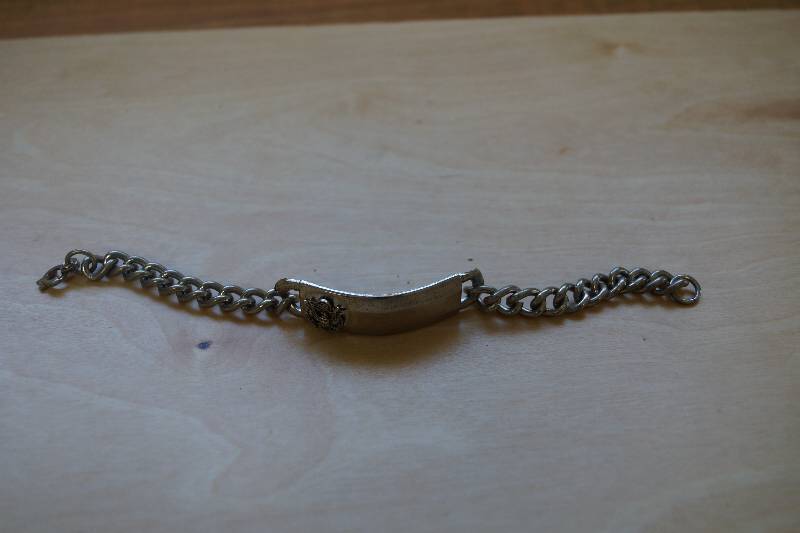 lot 415 image: Metal US Military ID Bracelet- UN-engraved