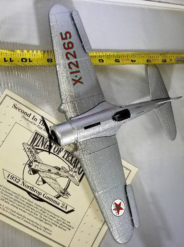 lot 313 image: ERTL-WINGS OF TEXACO SERIES BANK  132 Scale- 1932 Northropp Gamma