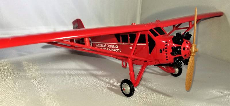 lot 310 image: ERTL-WINGS OF TEXACO SERIES BANK  132 Scale- 1929 Curtiss Robin