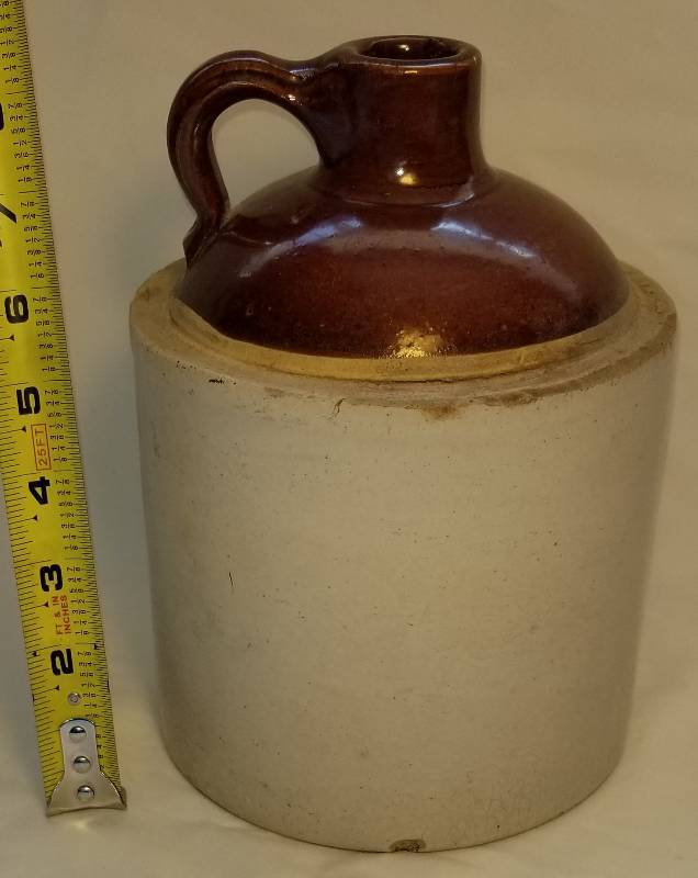 lot 319 image: Buckeye Pottery Whiskey Jug
