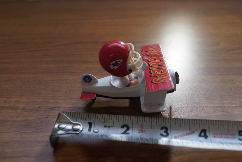 lot 17 image: Kansas City Chiefs Diecast-  Player In Airplane   Cute