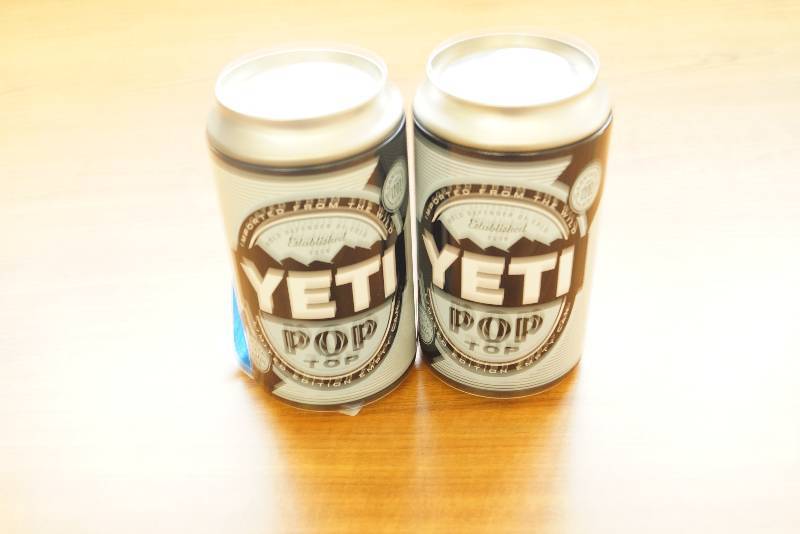 lot 16 image: Pair of Yeti Cans- Hide Your Stuff-  Lids Pop Off
