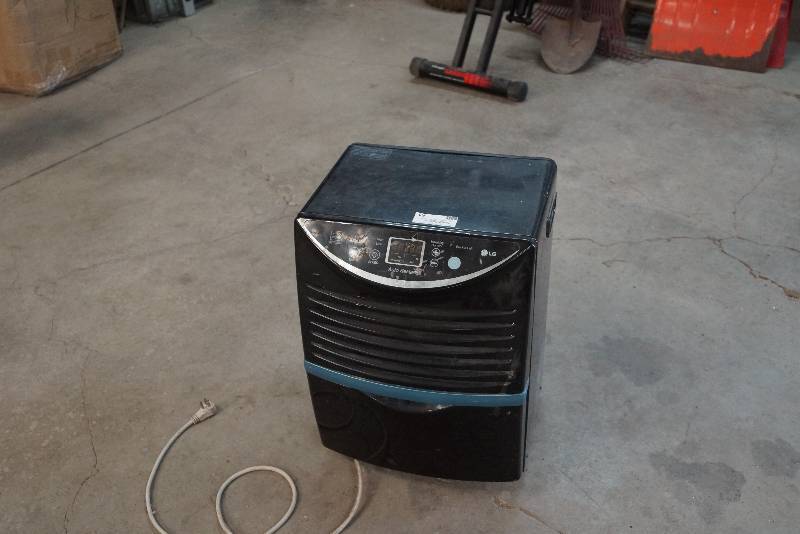 lot 51 image: Dehumidifier-  Perfect for Basement or Damp Areas  Tested  LG