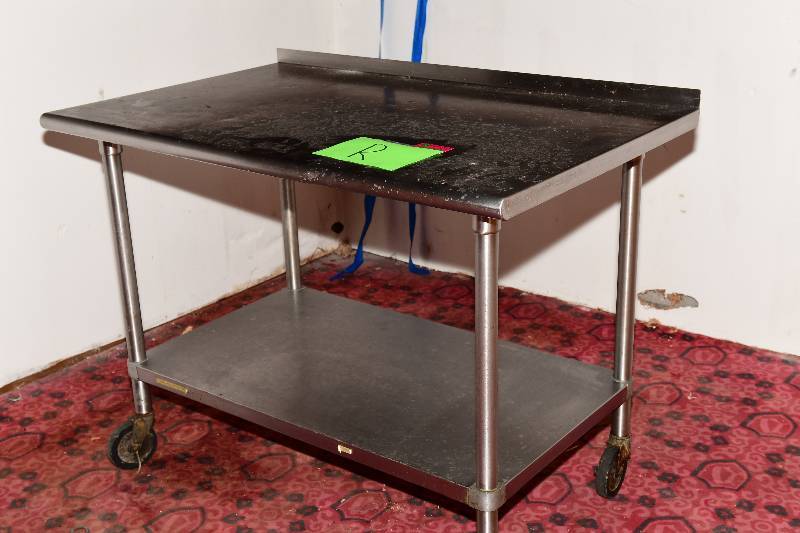lot 5672 image: All Stainless Steel Table on  Wheels w Backsplash