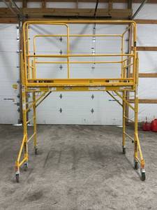 lot 47971 image: Werner 6ft Scaffolding Adjustable with Outriggers and Safety Railings 1000 lb Capacity