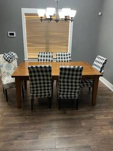 lot 48110 image: Wood Kitchen Table with Two Leaves and 6 Chairs with Covers