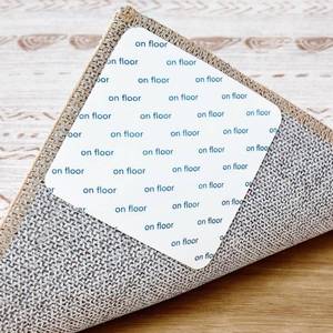 lot 22455 image: Nakagishi Rug Tape Rug Sticker for Hardwood Floors - 12 PCS Anti Slip Rug Grips Rug Stickers for Wood Floor Carpet Stickers for Area Rugs to Prevent Sliding - White