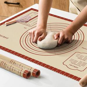 lot 2399 image: A 26x16 Inch Extra Thick Silicone Baking Mat with Measurements, Non-slip and Reusable - For Cookies, Bread, Pastry