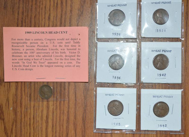 lot 4099 image: Lot of 7 Wheat Pennies- Including a 1909 Lincoln Cent- Wow
