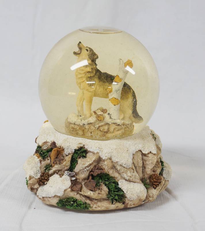 lot 2082 image: Wolf Figurine Water Snow Globe Music Box - Pretty