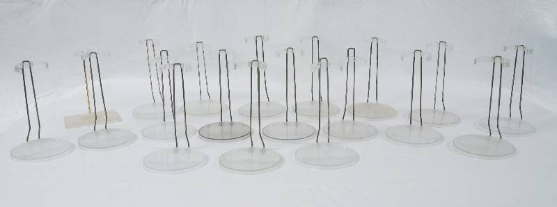 lot 2021 image: Lot of 19 Madame Alexander Doll Stands