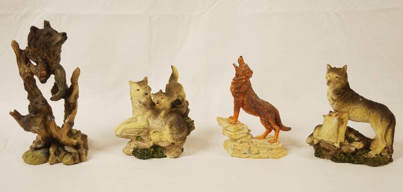 lot 2105 image: Lot of 4 Wolf Figurines - Nice