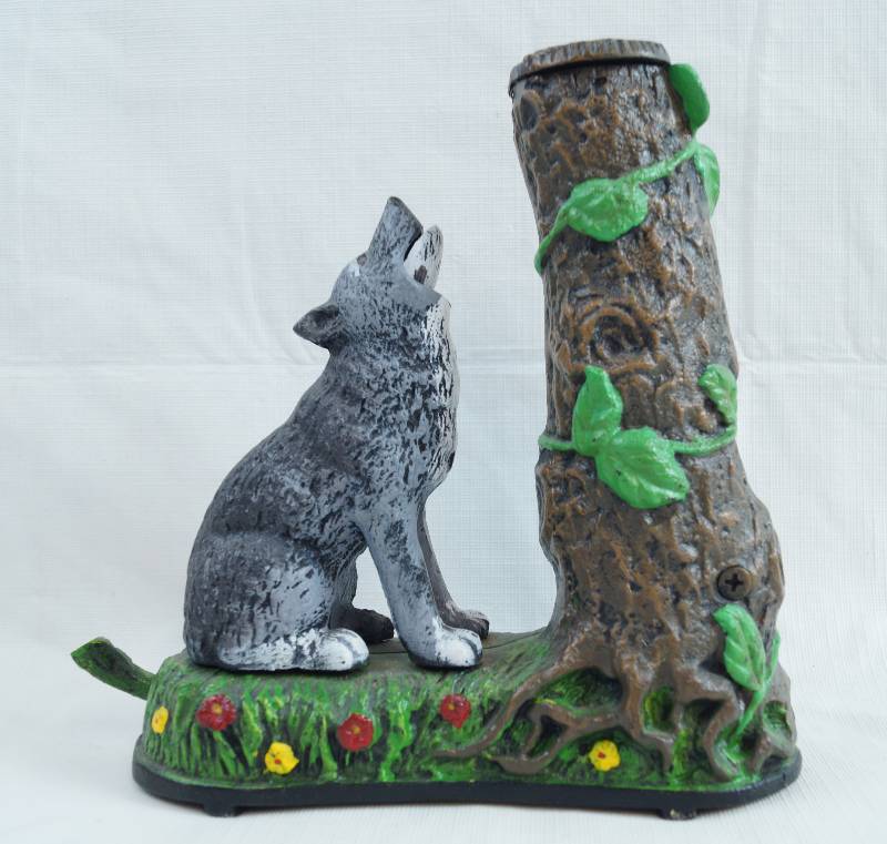 lot 2274 image: Cast Iron Bank - Wolf Howling at Squirrel - AWESOME