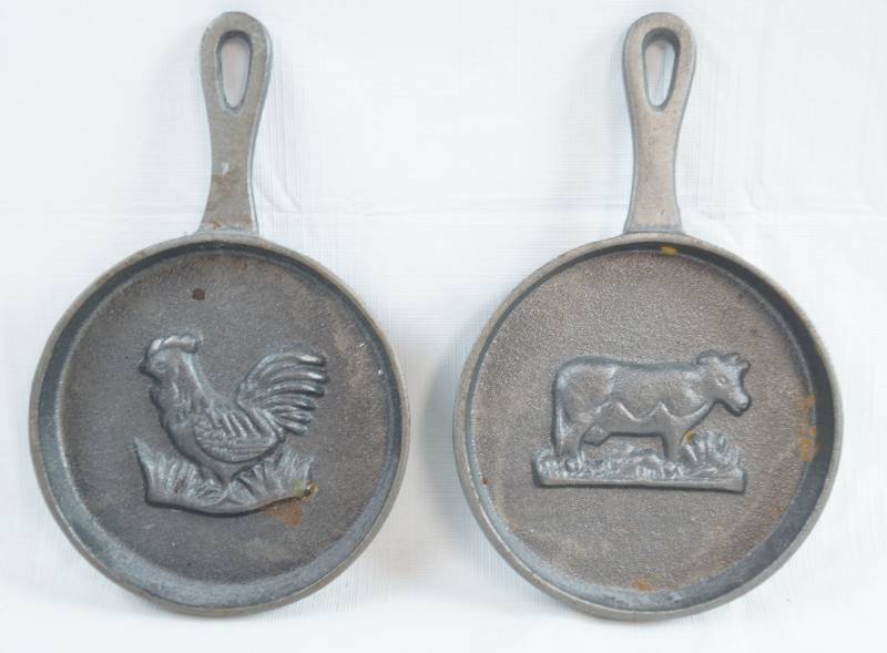 lot 2278 image: Cast Iron - Farm Animal Decorative Pans - Cow and Chicken - See Photos