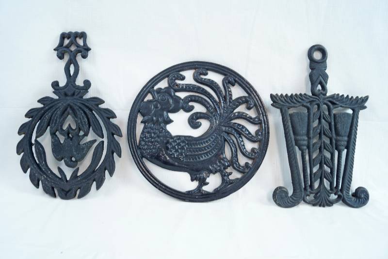 lot 2279 image: Cast Iron Metal Trivets - Rooster, Barn Style and more See Photos for Details