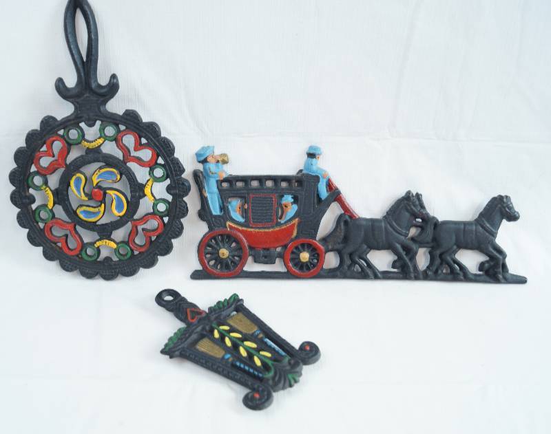 lot 2282 image: Painted Cast Iron Home Decor - Trivets and Sad Iron Trivet - Very Cool