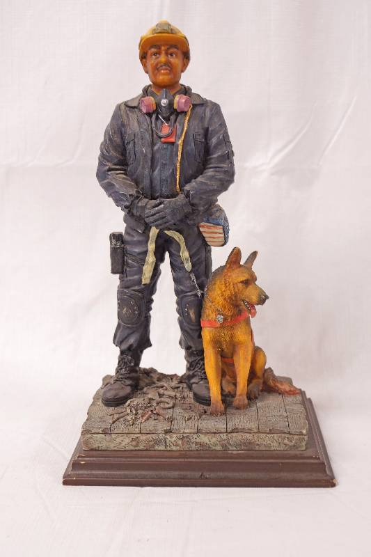 lot 2217 image: Worker with German Shepherd Figurine - Neat