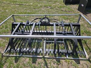 lot 7667 image: Unused&nbspJCT Hydraulic Rock Grapple Attachment for Skid Steer 84 W
