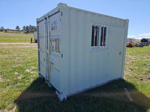 lot 7699 image: Unused&nbsp10ft Storage Container KJ W025079 with Window and Personnel Door