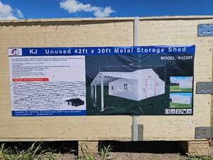 lot 7709 image: KJ 42ft x 30ft Metal Storage Shed Model K4230T New in Box