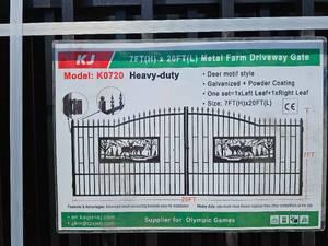 lot 7727 image: Unused&nbspKJ K0720 Heavy-Duty Metal Farm Driveway Gate 7x20ft with Deer Motif