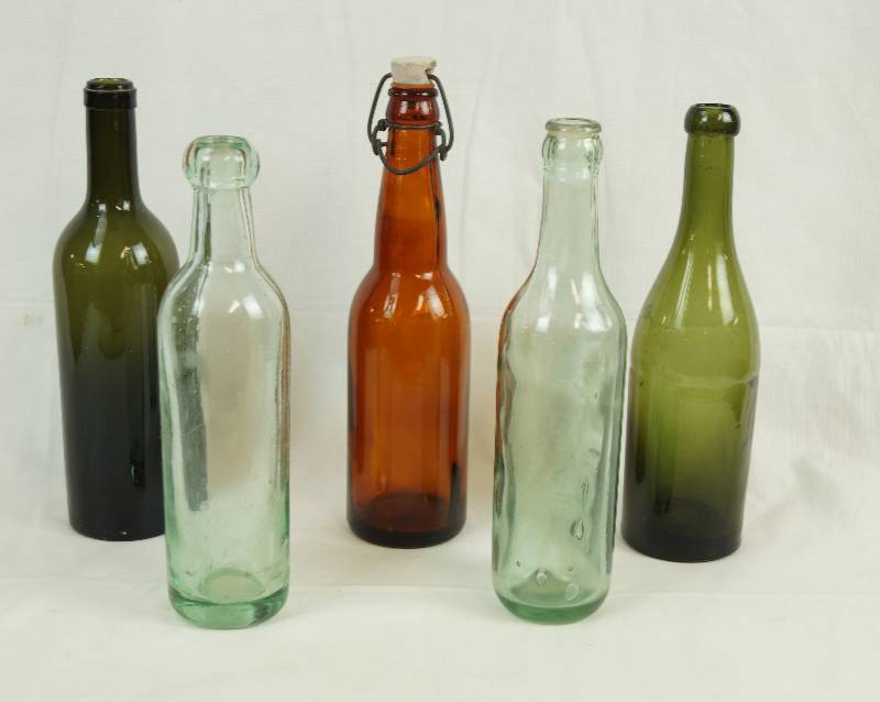 lot 2464 image: Decorative Wine Bottles - Colored Glass - Some Vintage - See Pics