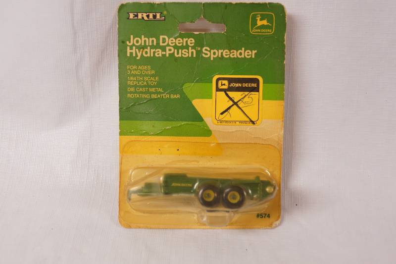 lot 2235 image: ERTL - Die Cast Model JOHN DEERE Hyra Push Spreader - NEW IN ORIGINAL PACKAGE 0562